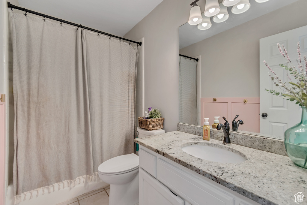 Bathroom featuring vanity and tile patterned floors