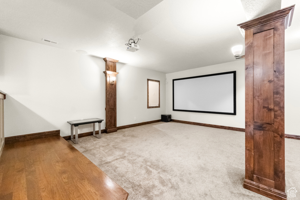 Carpeted cinema with baseboards