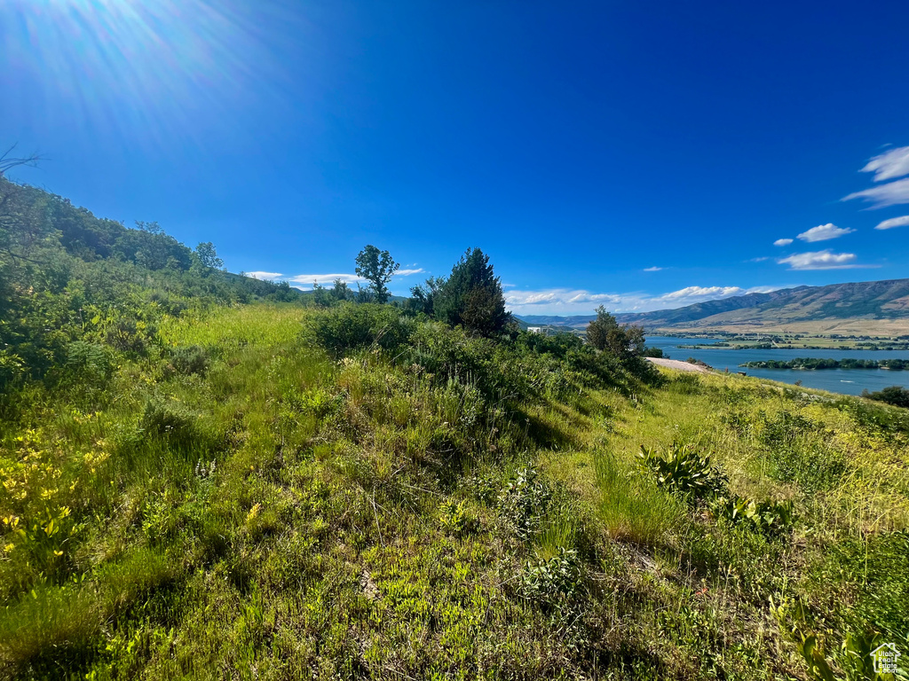 View of mountain backdrop with a large body of water