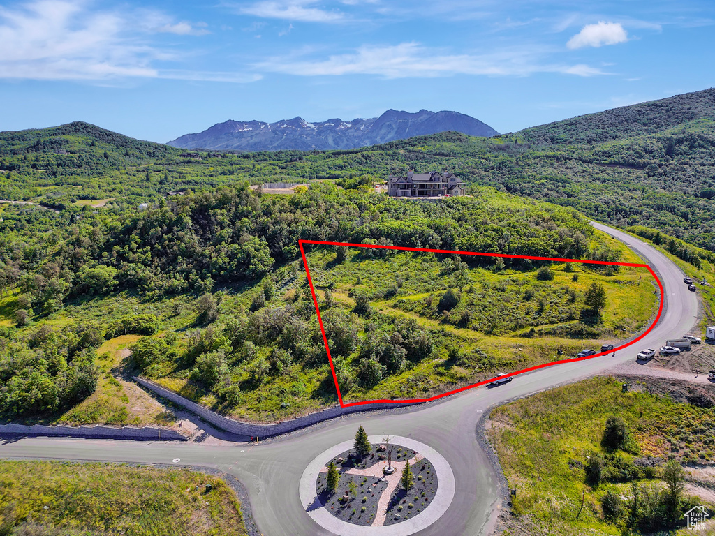 View of property location with property parcel outlined and a mountainous background