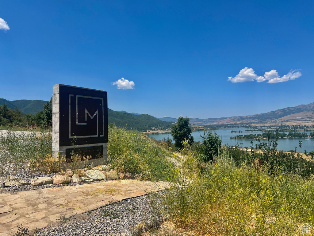 View of mountain background featuring a nearby body of water
