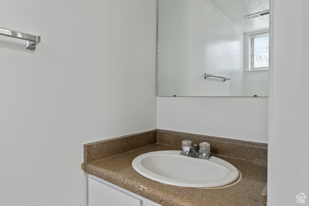 Bathroom featuring vanity