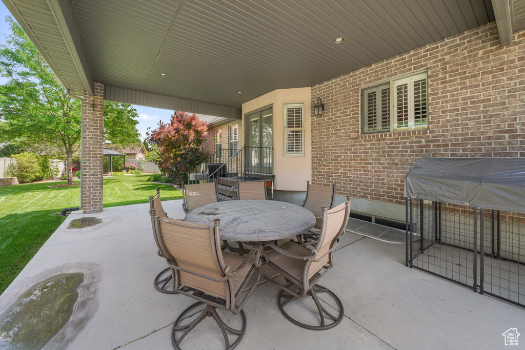 View of patio featuring outdoor dining area