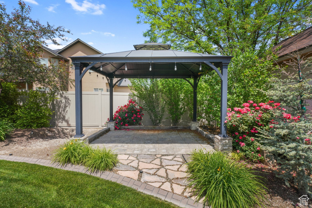 View of patio featuring a gazebo