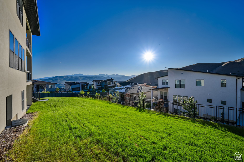 View of yard with a mountain view and a residential view