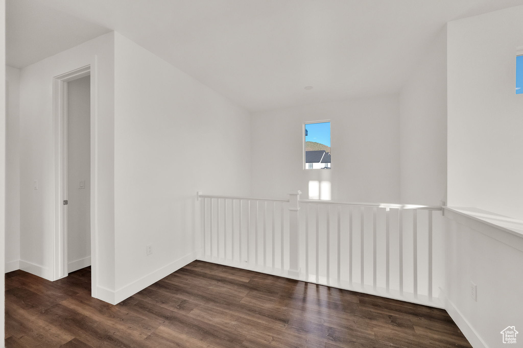 Bonus room featuring wood finished floors