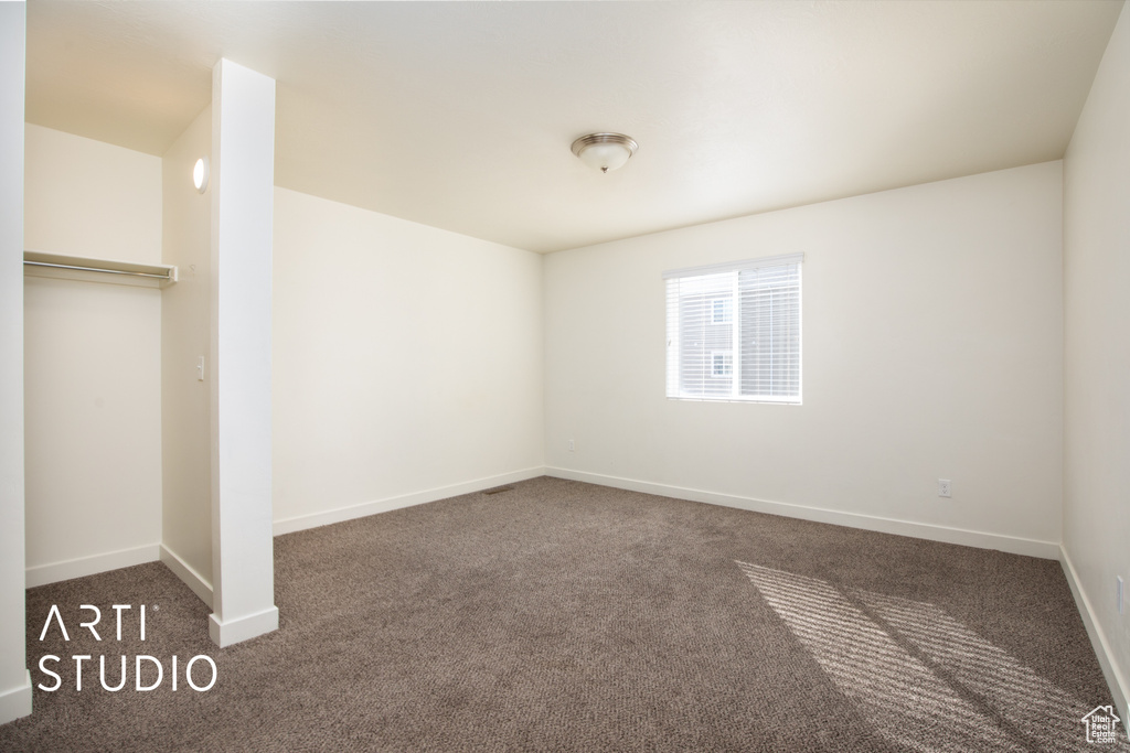 Unfurnished bedroom with carpet floors