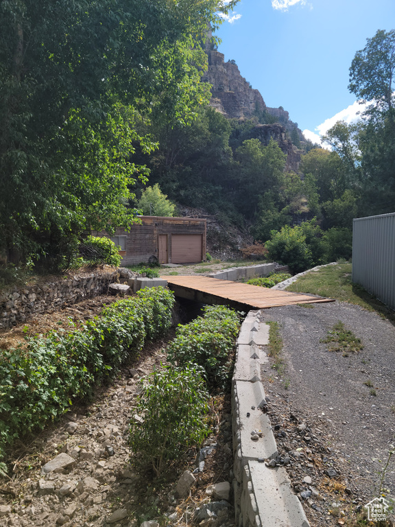View of yard with a garage