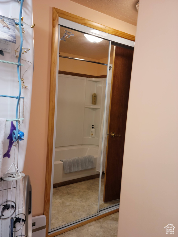 Full bathroom with bathtub / shower combination