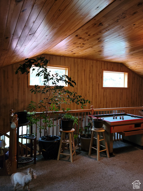 Playroom with lofted ceiling, wooden walls, wood ceiling, billiards table, and carpet floors