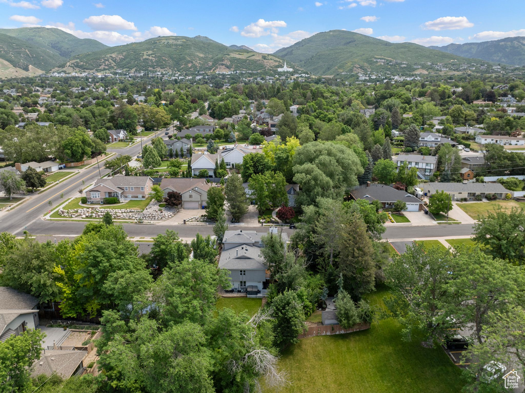 Aerial view of residential area with mountains
