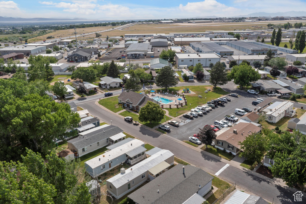 Aerial perspective of suburban area featuring a pool area