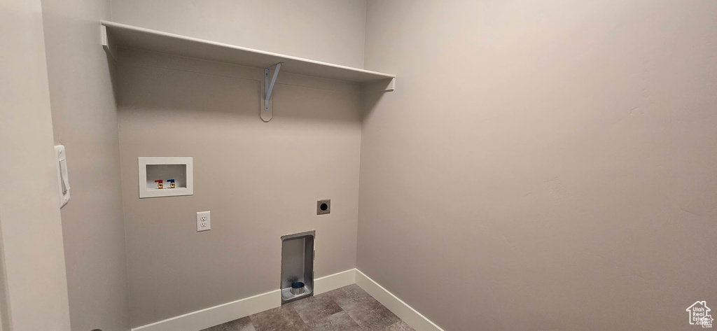 Washroom with hookup for a washing machine and hookup for an electric dryer