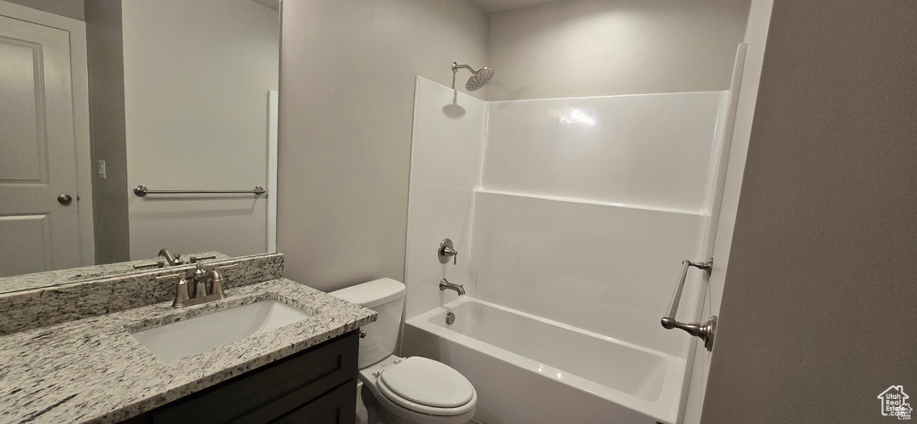 Full bath featuring vanity and bathtub / shower combination
