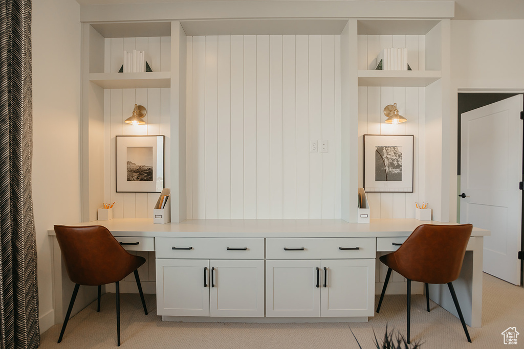 Home office featuring built in study area and built in features