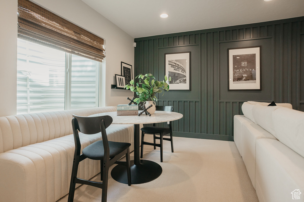 Dining room with breakfast area, recessed lighting, and light carpet