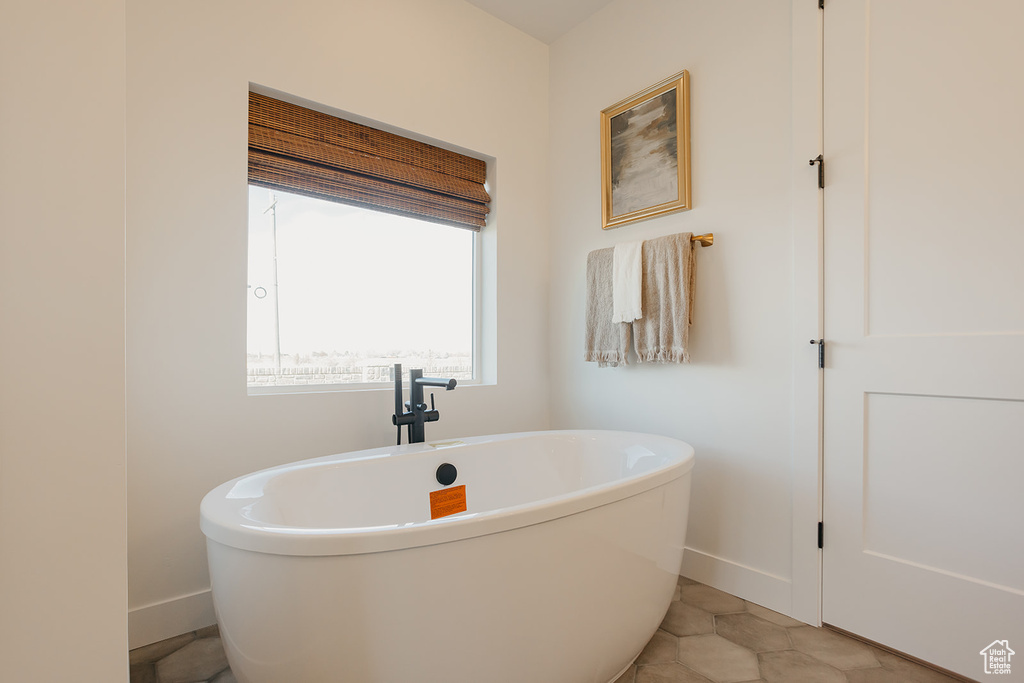 Bathroom featuring a freestanding tub
