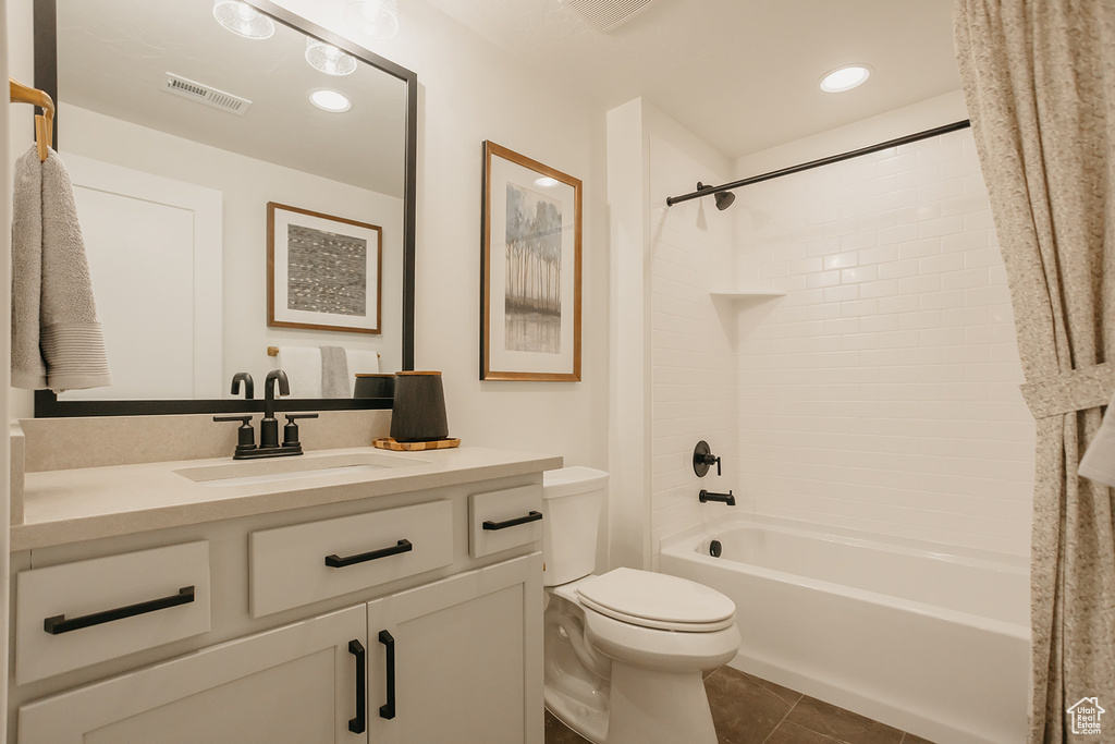 Bathroom with shower / tub combo, vanity, tile patterned flooring, and recessed lighting