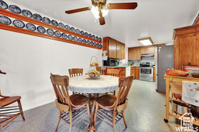 Dining area with a ceiling fan