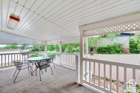 View of patio with outdoor dining space