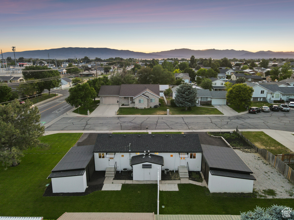 Aerial view at dusk of a mountain view and a residential view