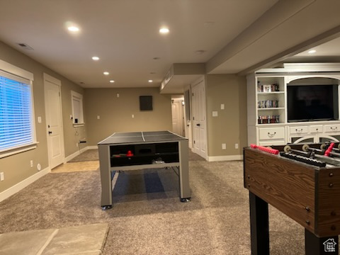 Rec room with recessed lighting and carpet floors