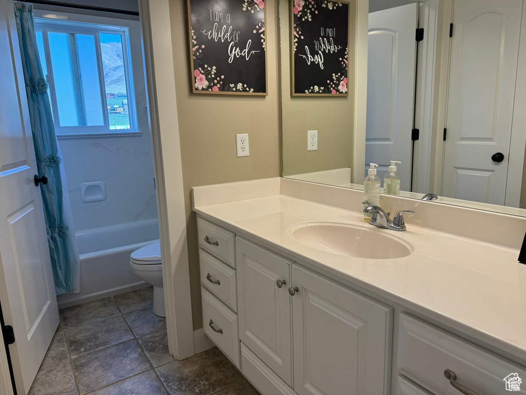 Full bathroom featuring vanity and shower / bath combo