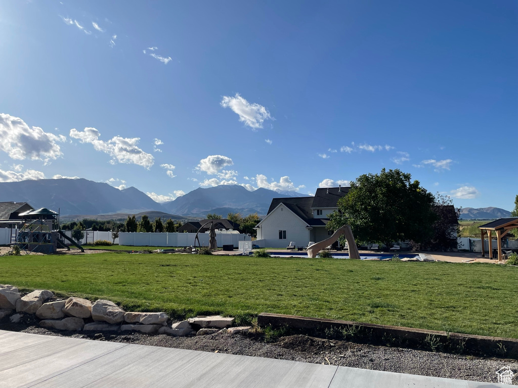 View of yard with a mountain view