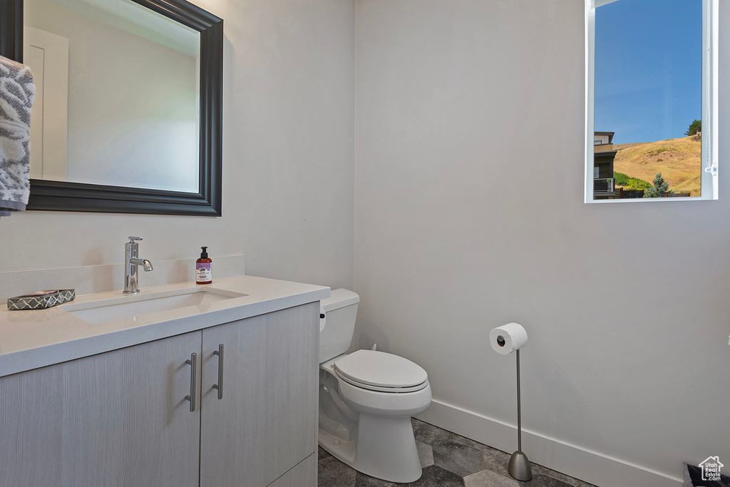 Bathroom with toilet and vanity