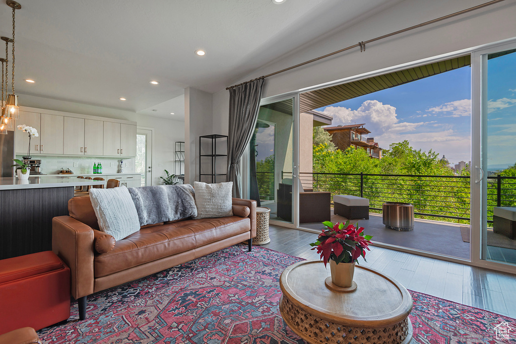 Living area featuring plenty of natural light, recessed lighting, and wood finished floors