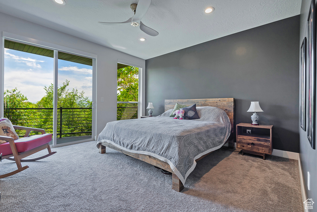 Carpeted bedroom featuring access to outside, recessed lighting, and ceiling fan