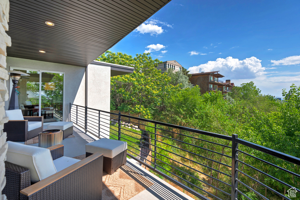 Balcony featuring an outdoor living space