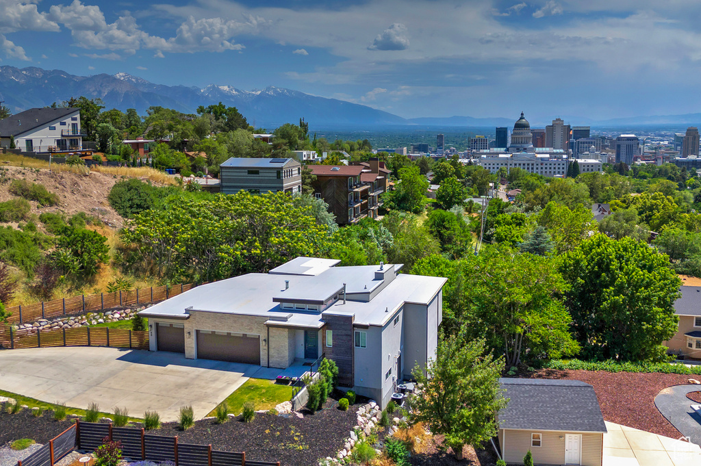 View of subject property with a mountain backdrop