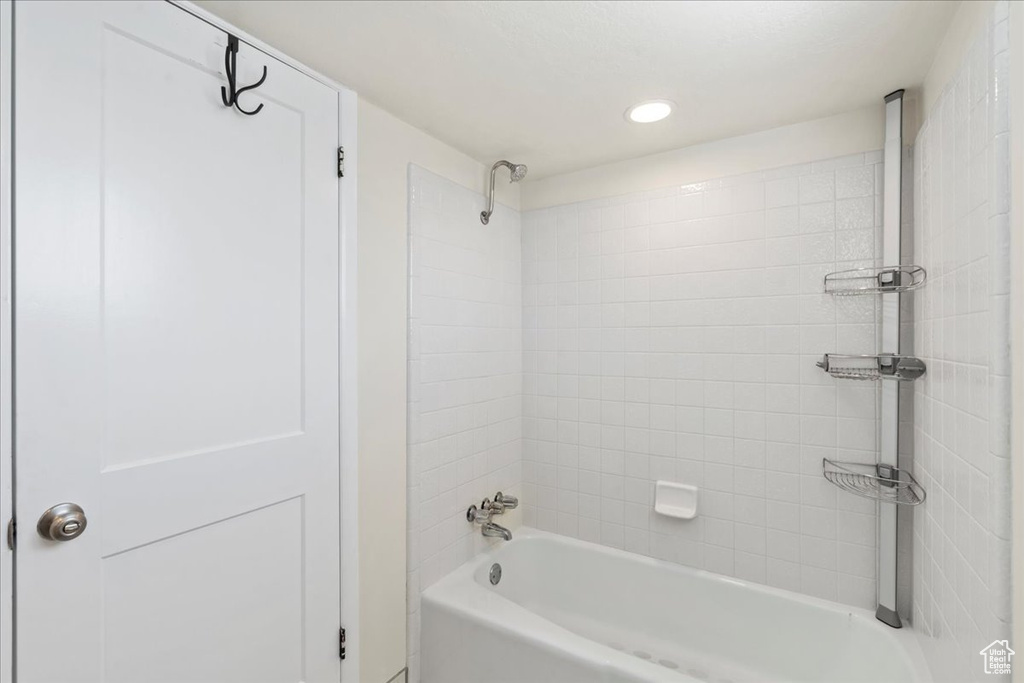 Full bath with tub / shower combination and recessed lighting