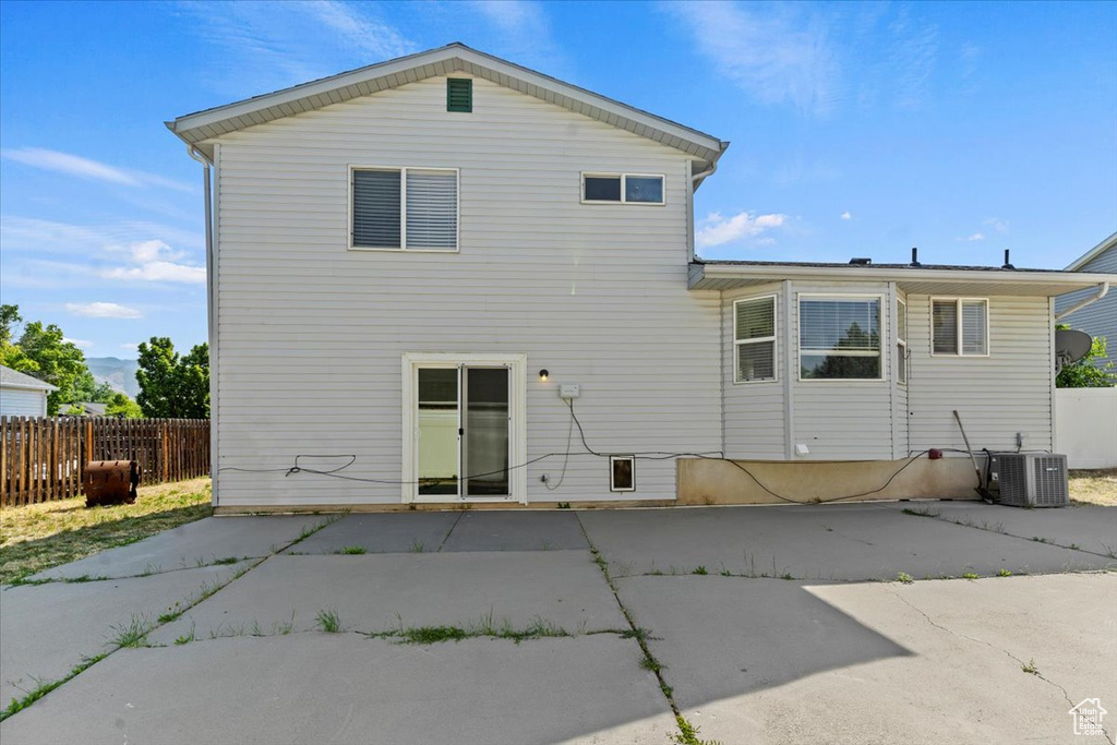 Rear view of house with a patio