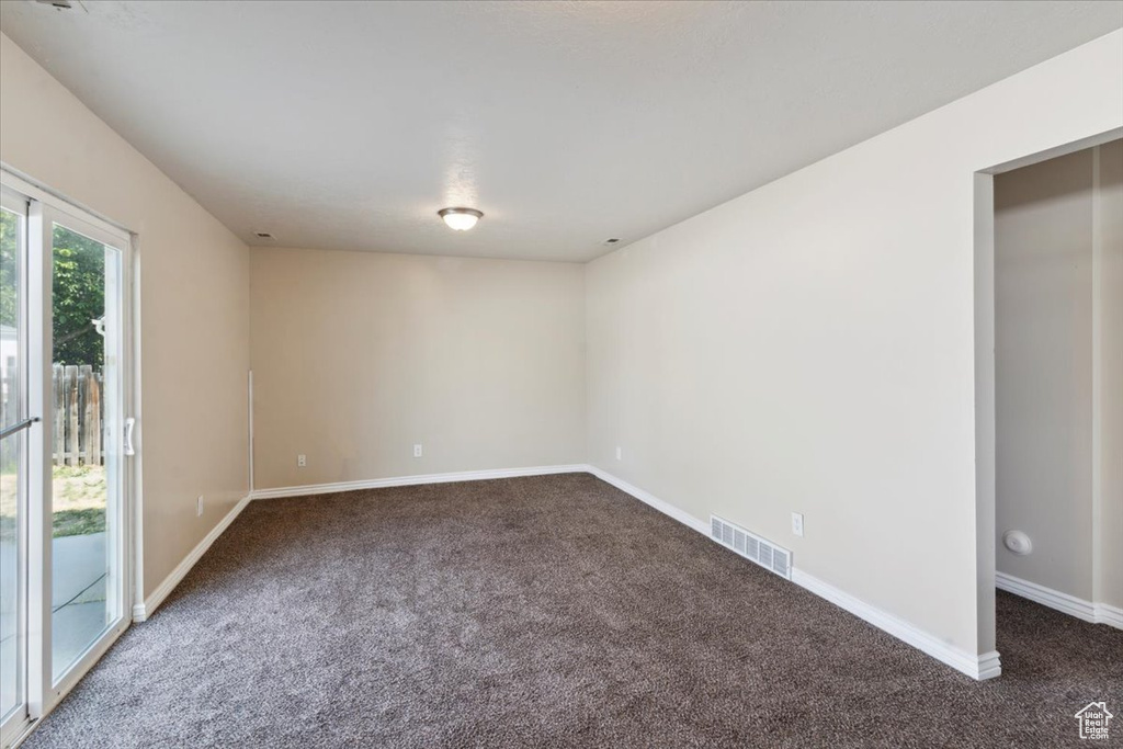 Unfurnished room featuring carpet floors