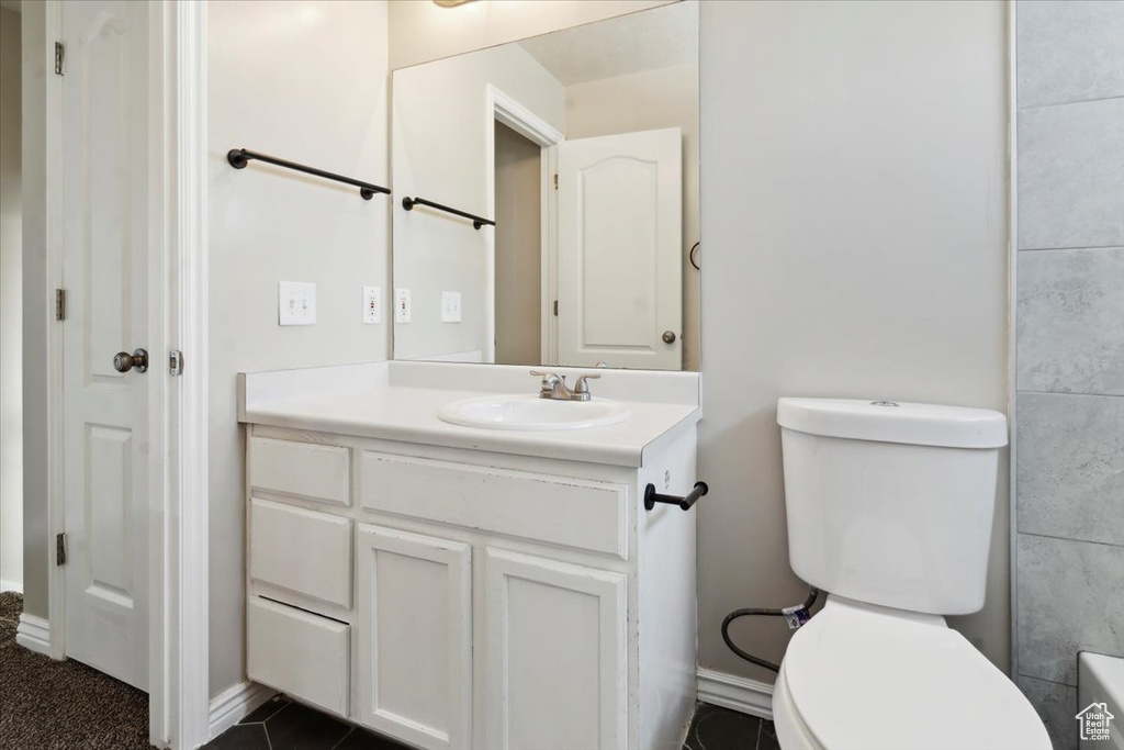 Bathroom with vanity and toilet