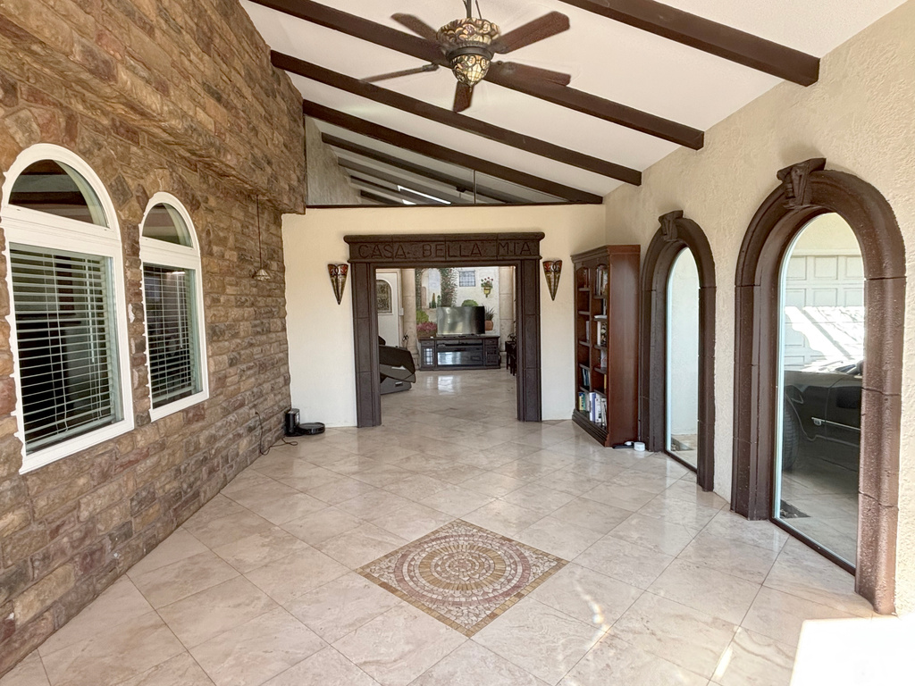 View of patio / terrace with ceiling fan