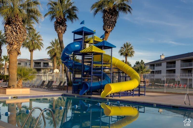 Community pool with a water slide