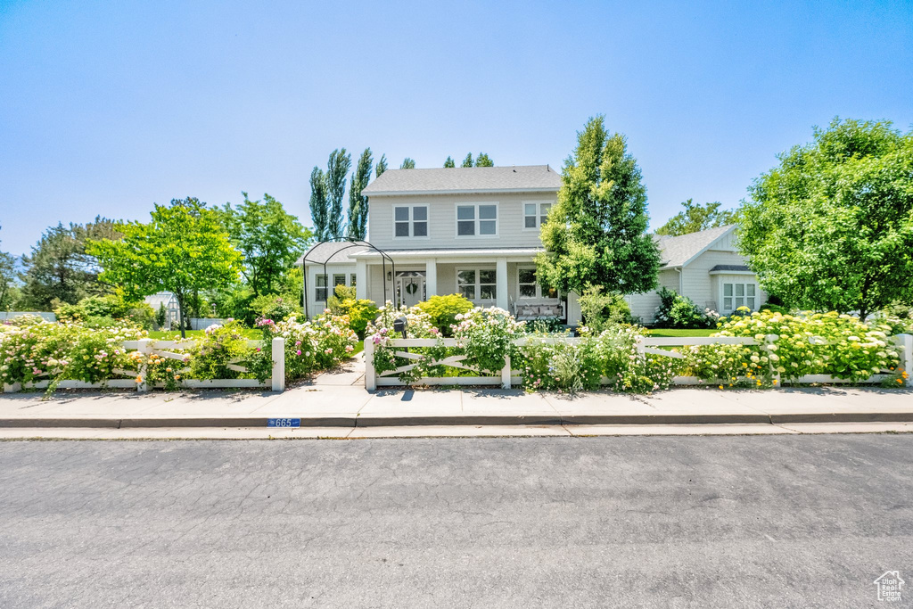 View of front of house featuring a vegetable garden