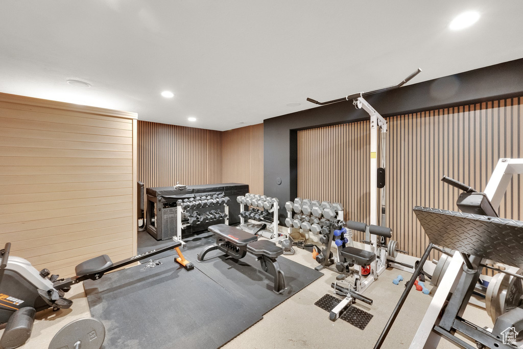 Workout room featuring recessed lighting