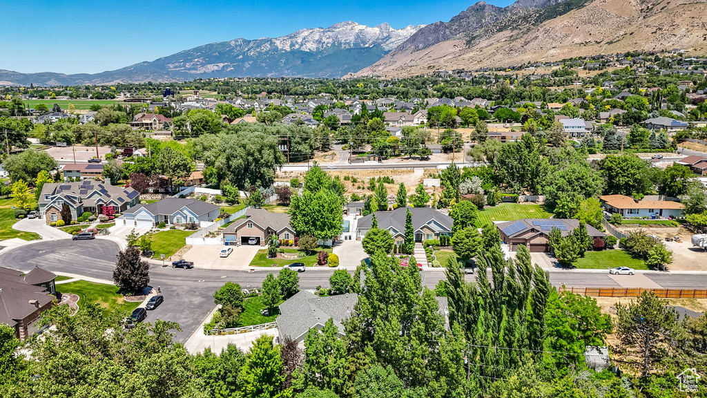 Aerial view of residential area with mountains