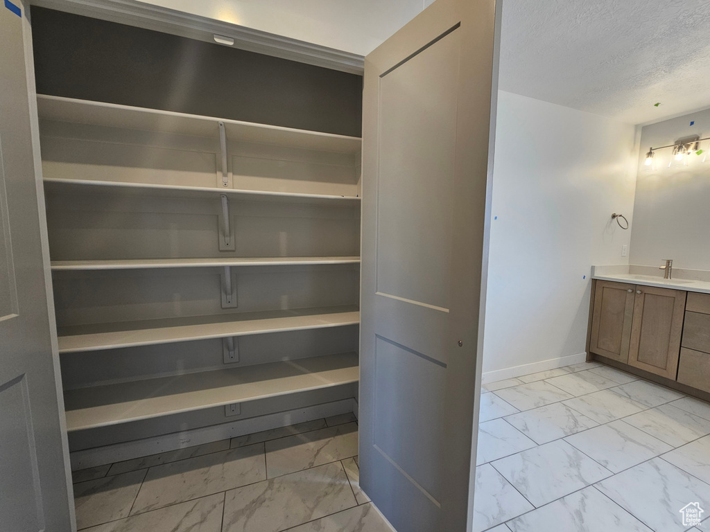 Storage area featuring a sink