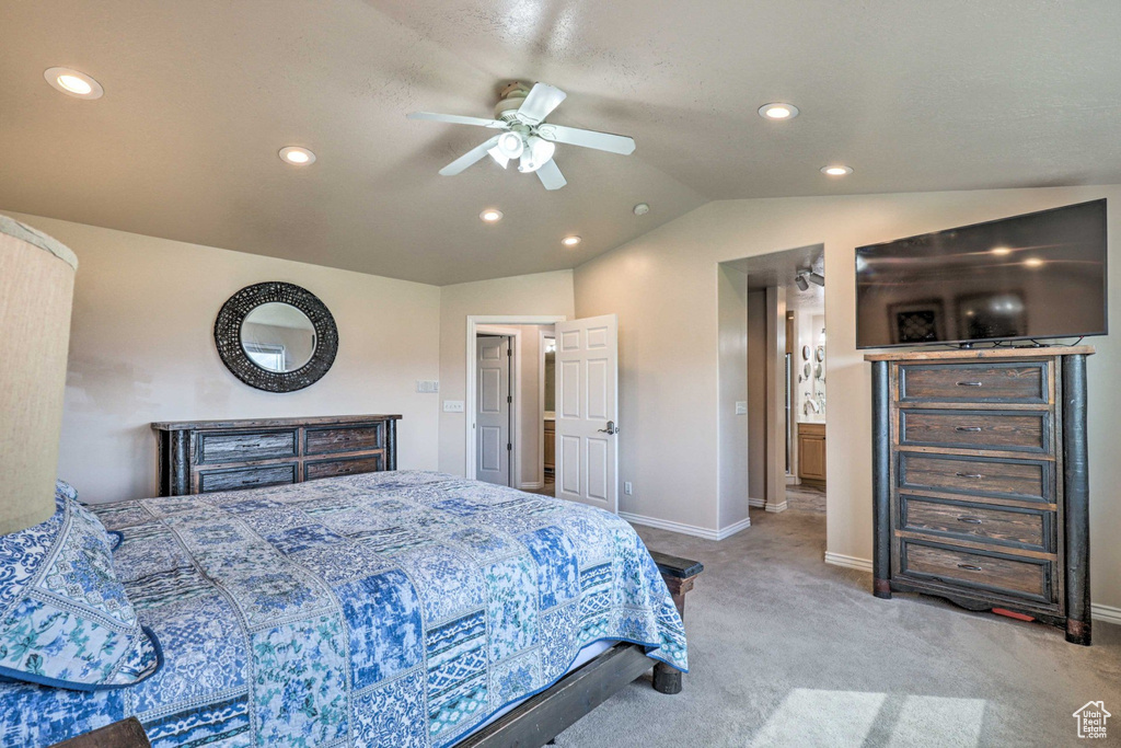 Carpeted bedroom featuring recessed lighting, lofted ceiling, and a ceiling fan