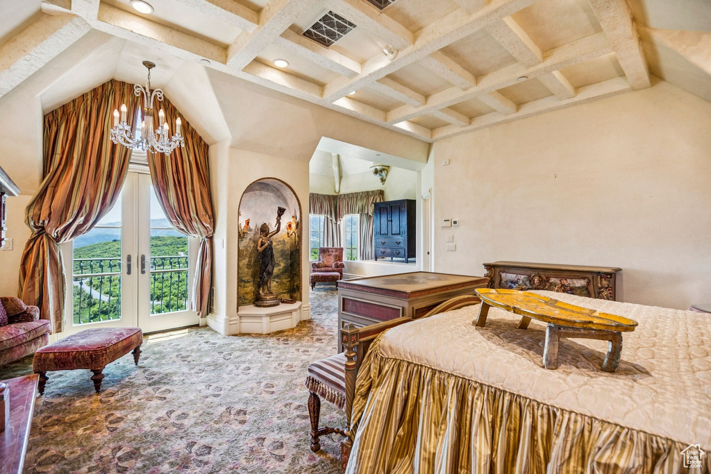 Bedroom with a chandelier, access to exterior, carpet flooring, and coffered ceiling