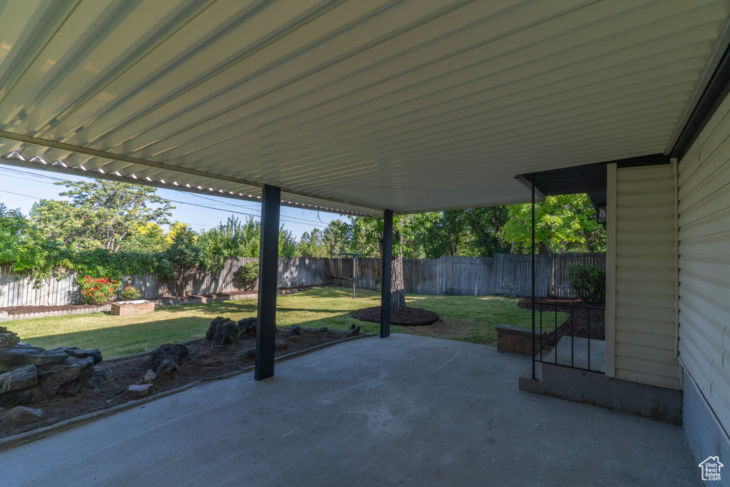 Fenced backyard featuring a patio area