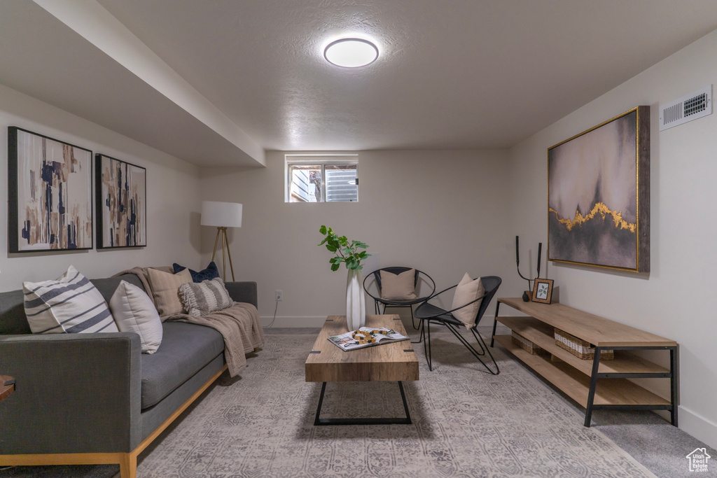 Living area featuring baseboards