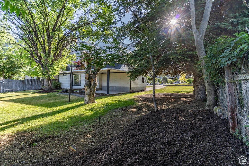 View of yard with a patio area