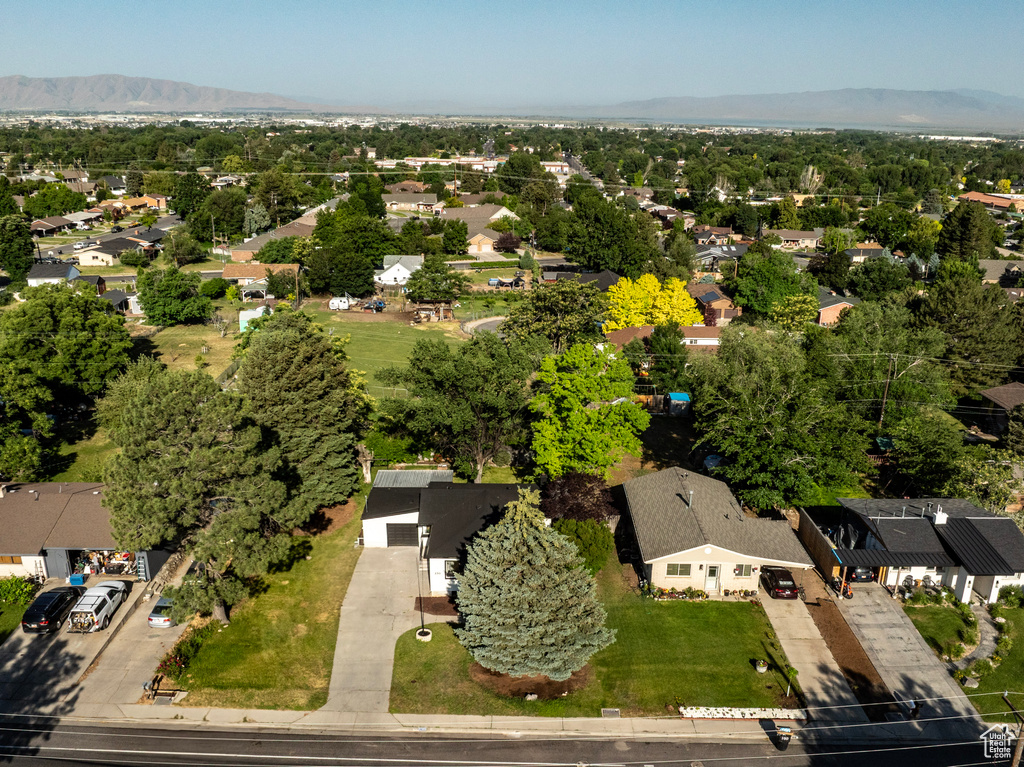 Aerial view of residential area with a mountainous background