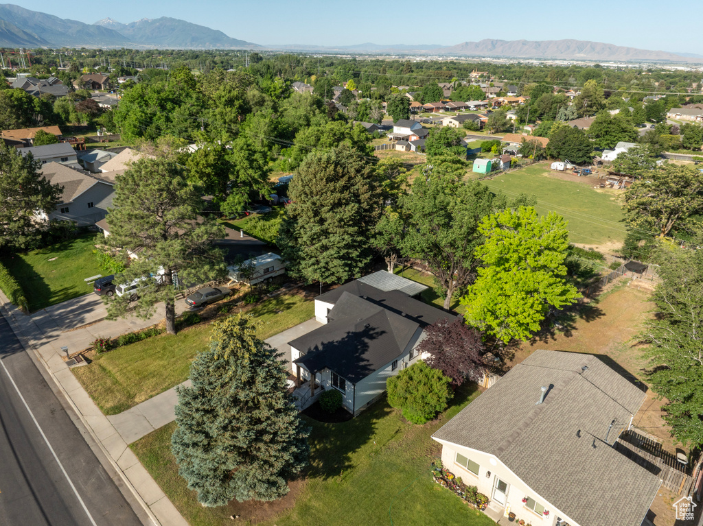Aerial view of residential area with a mountainous background
